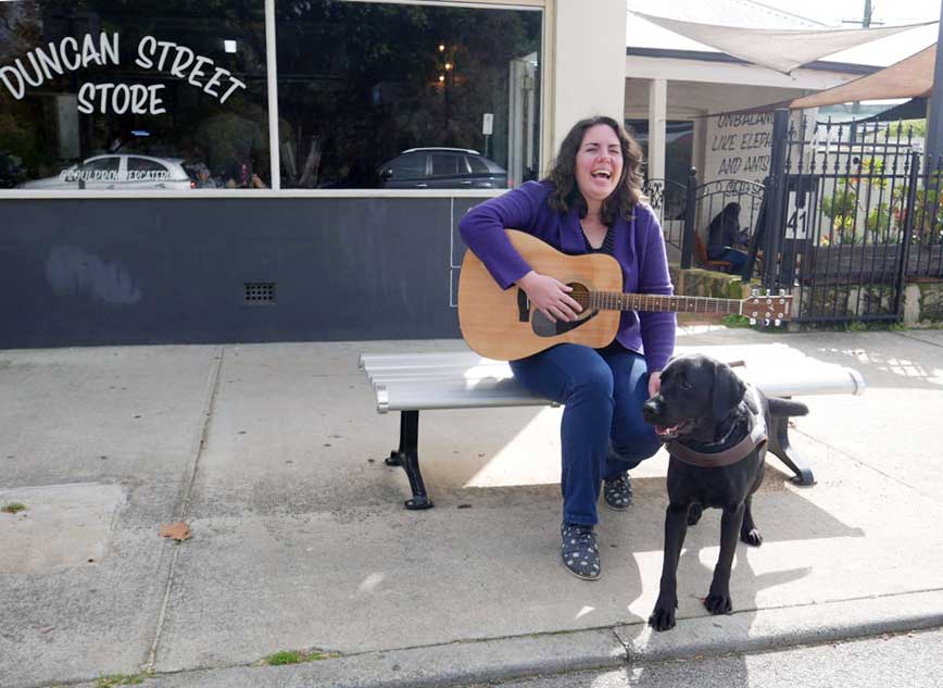 Claire with her black labrador, Guide Dog, Willow